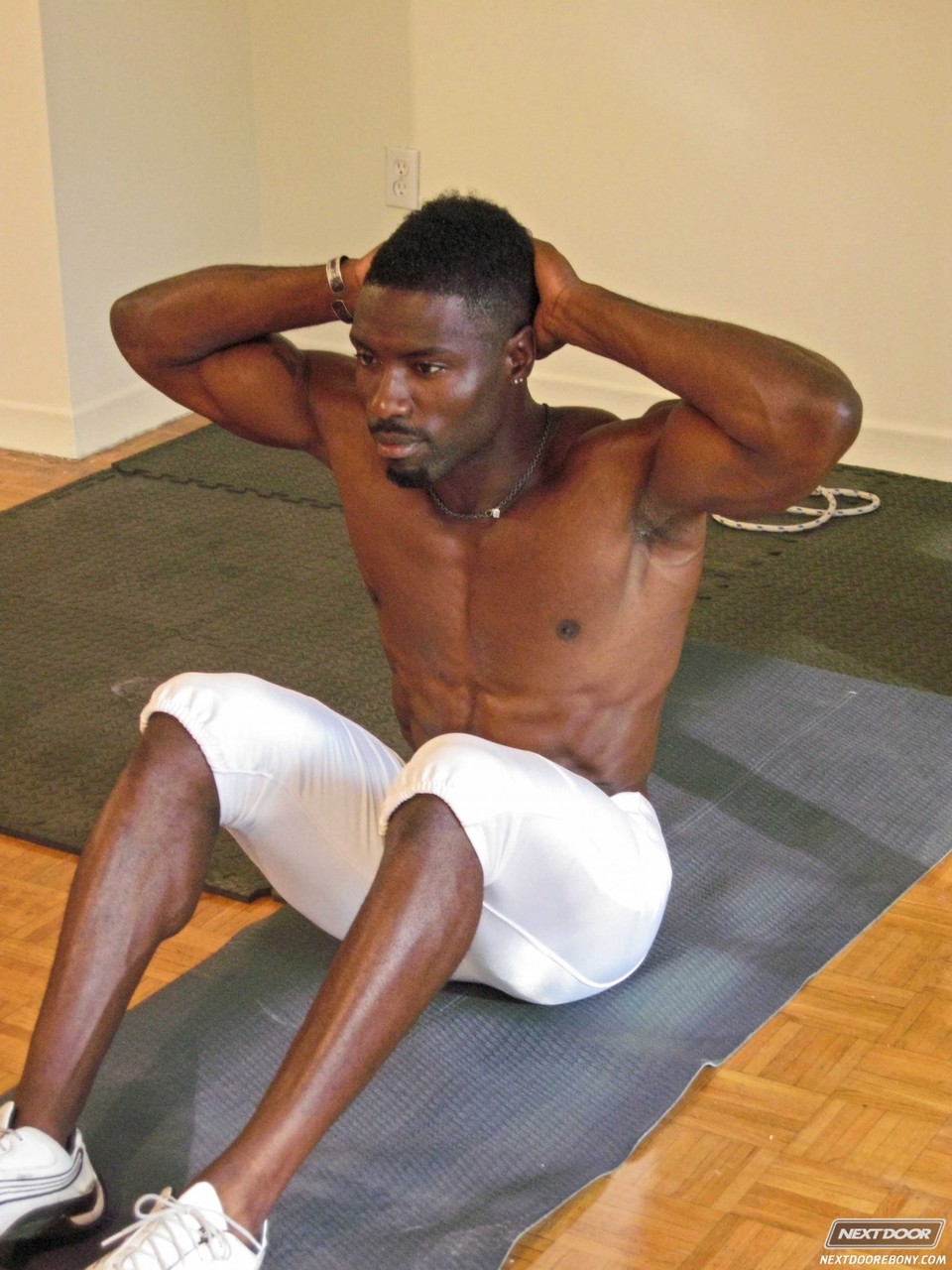 Muscular black guy Sexxx Toy reveals his big prick and poses after exercising  