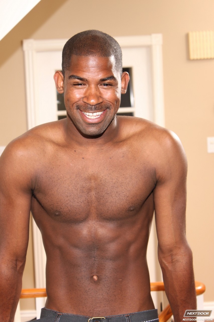 Brawny black stud Scottie A strokes his big dick until it stands fully erect  