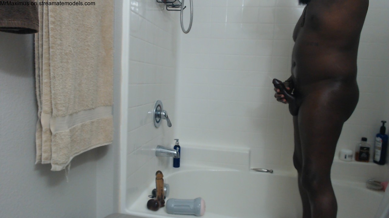 Lonely black gay stud gets caught masturbating hard in the shower  