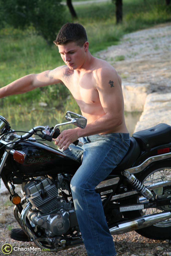 Inked gay biker Caleb unveils his sexy body and jerks off in a solo  