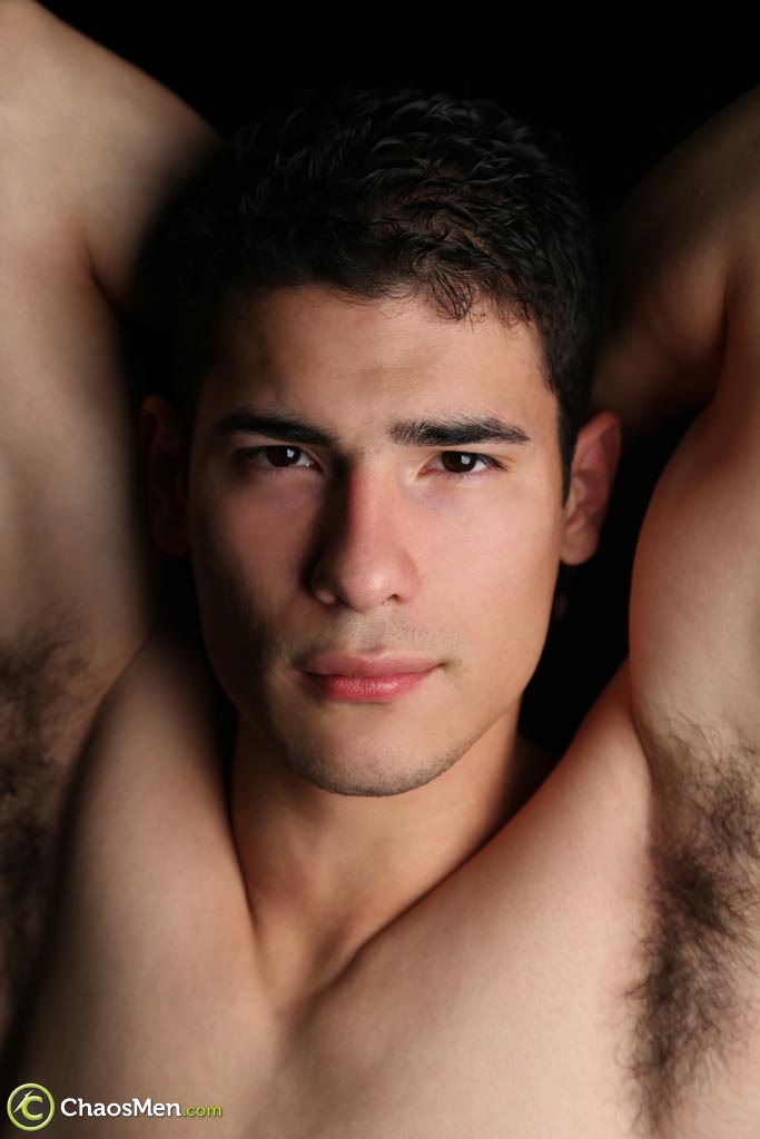 Gay hottie Troi undresses and reveals his lean body and big hairy dick  