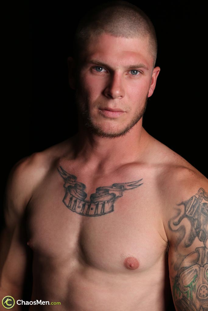 Shaved-headed gay model Sterling shows off his sexy inked body & big dick  