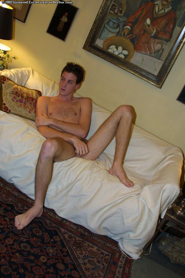 Badass gay hottie Jake Thomas undressing and massaging his uncut dick  