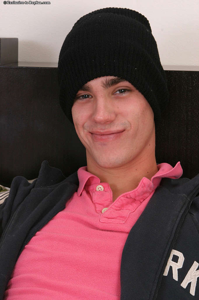 Cute gay in a beanie Louden exposes his hairy body and masturbates  
