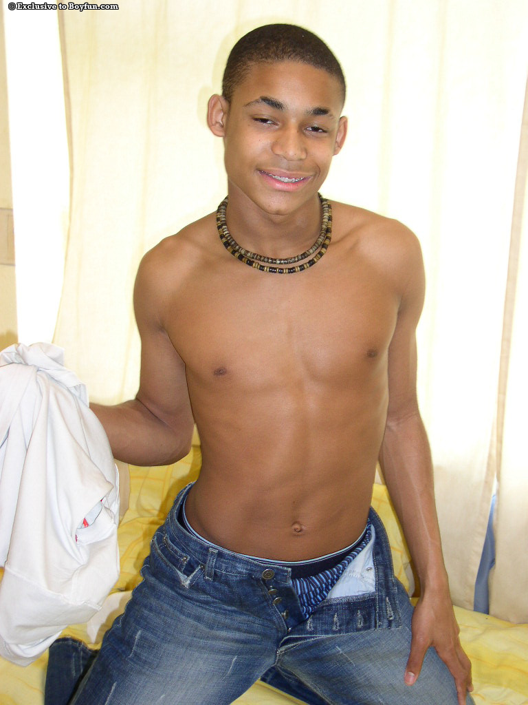 Skinny black gay Andrew displays his body and fondles his hairy dick  