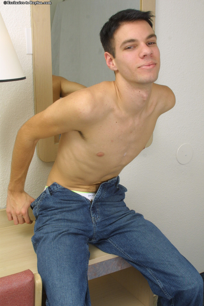 Horny skinny gay Alexander doffs his jeans and shirt and masturbates  