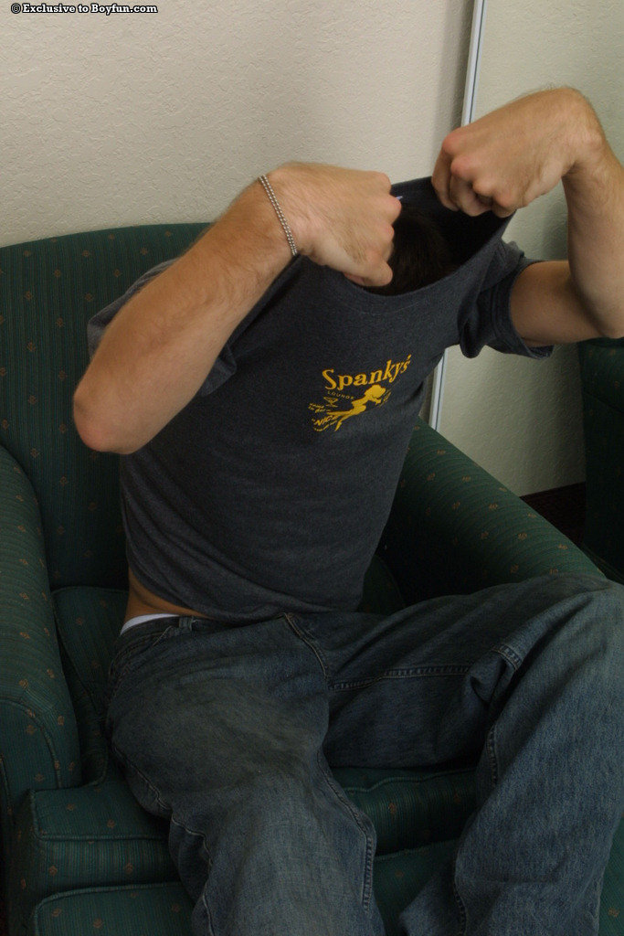 Sweet young gay Kirk doffs his shirt and jeans and masturbates in a solo  