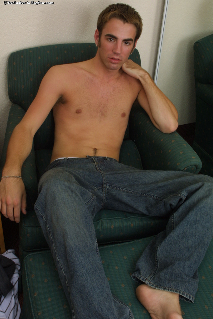 Sweet young gay Kirk doffs his shirt and jeans and masturbates in a solo  