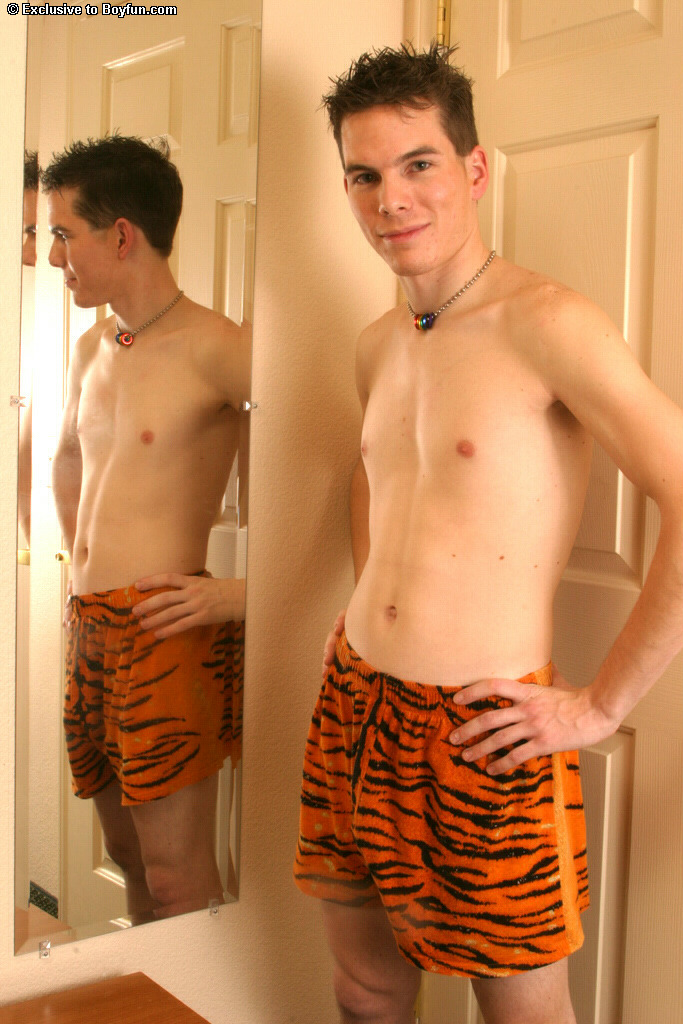 Hot skinny gay boy Tiger unveils his ass and strokes his sexy hard cock  