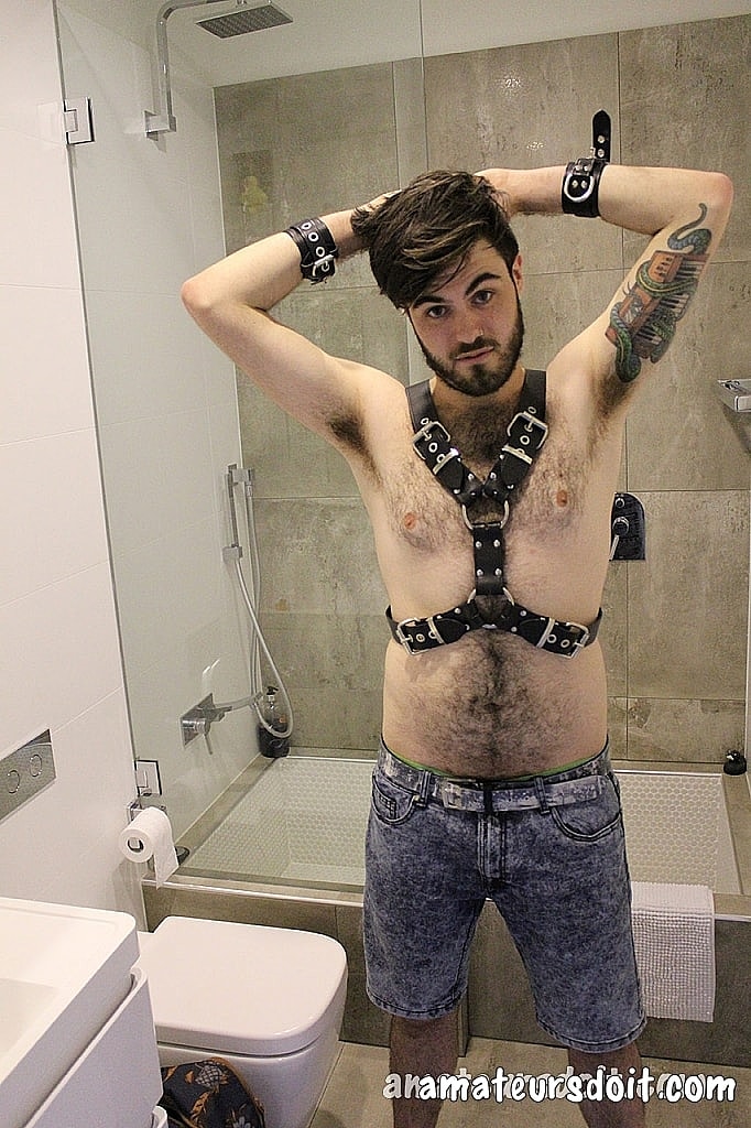 Gay amateur Mitch Bear doffs his clothes & toys his hairy asshole in BDSM gear  